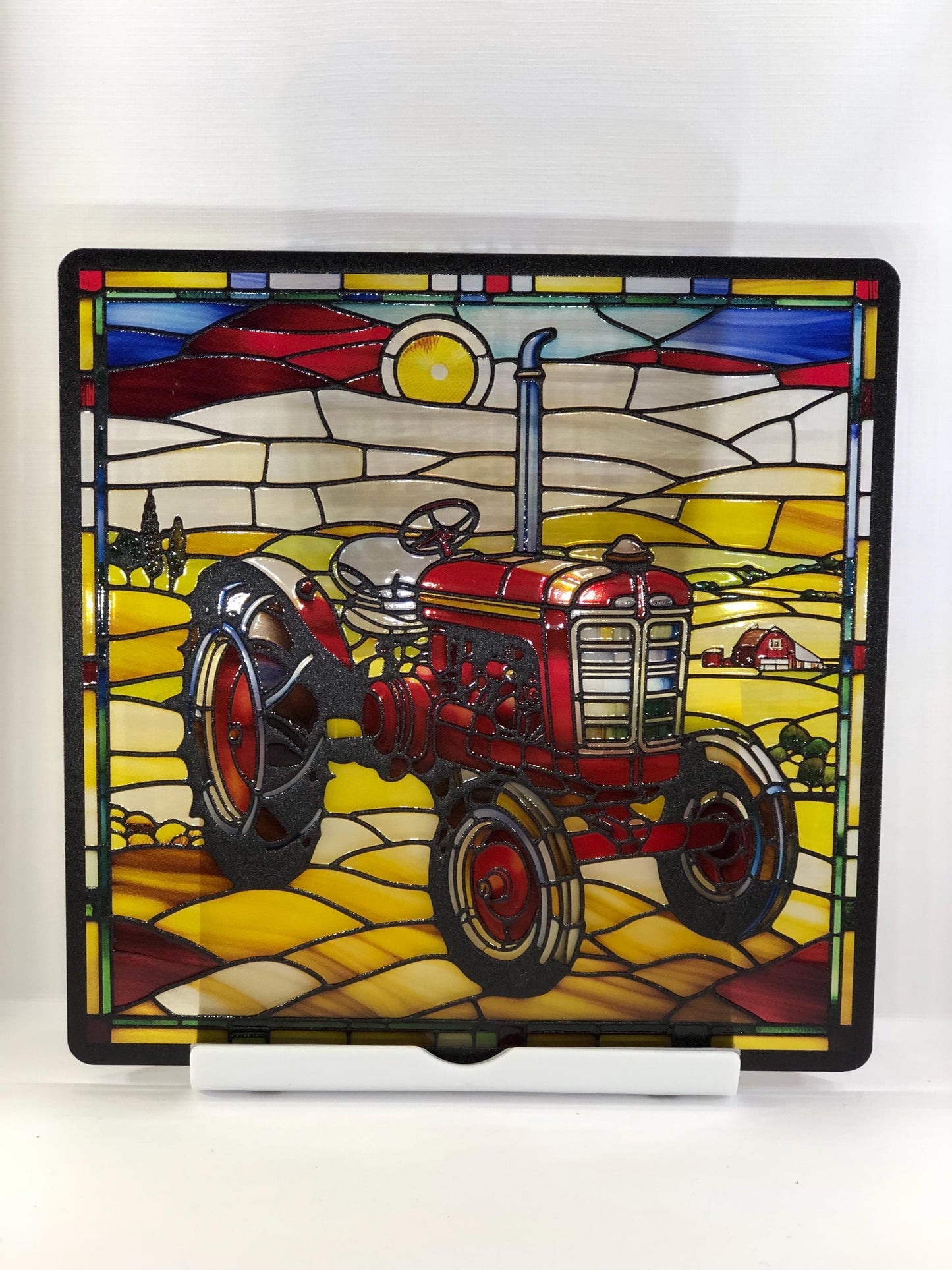 Vitrail le tracteur rouge