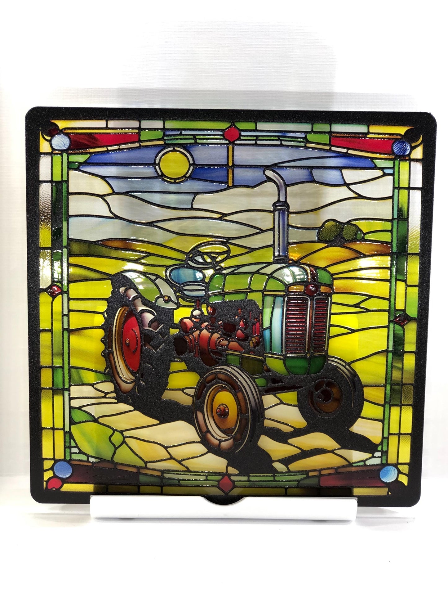 Vitrail le tracteur vert